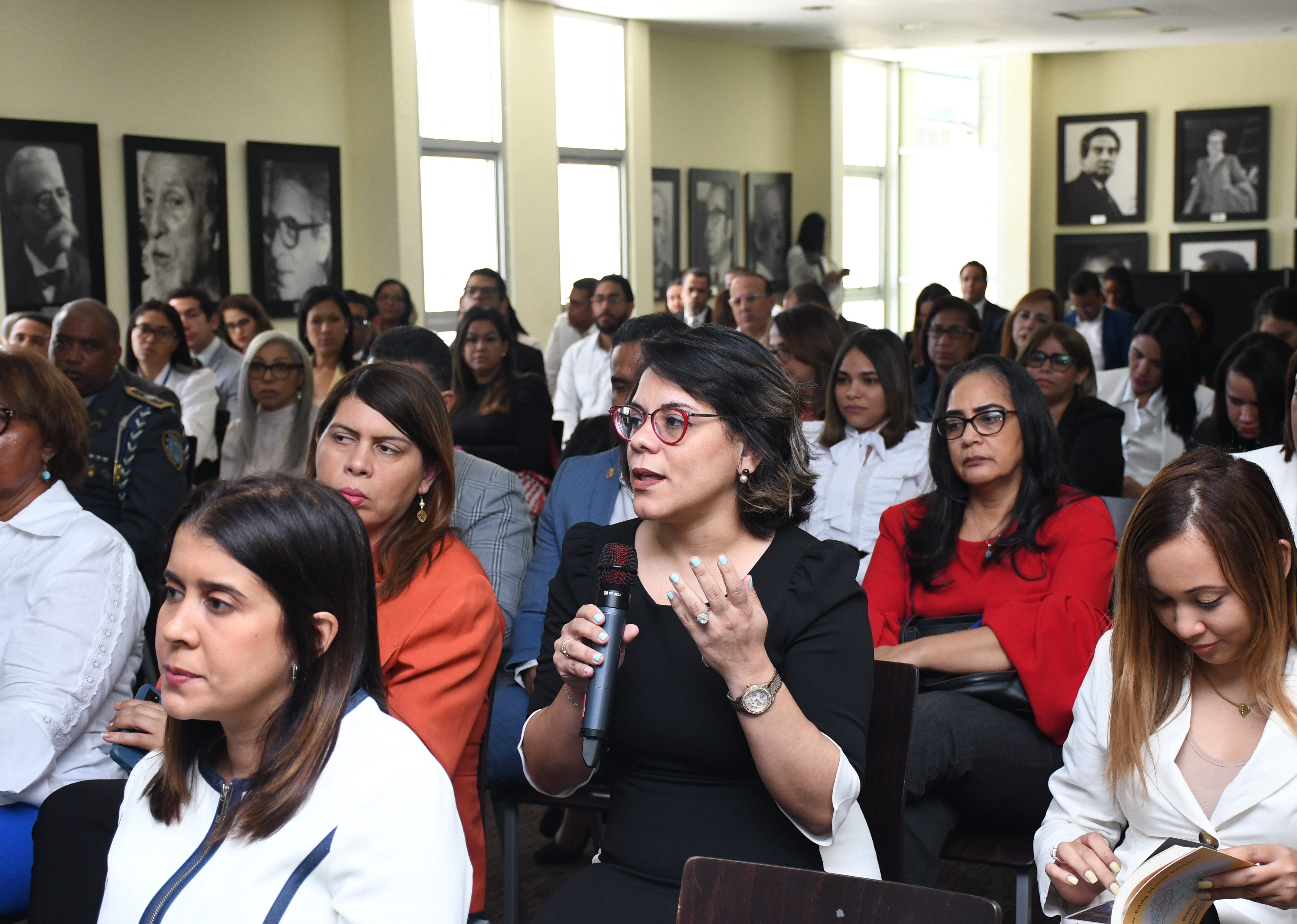 Woman speaking into mic