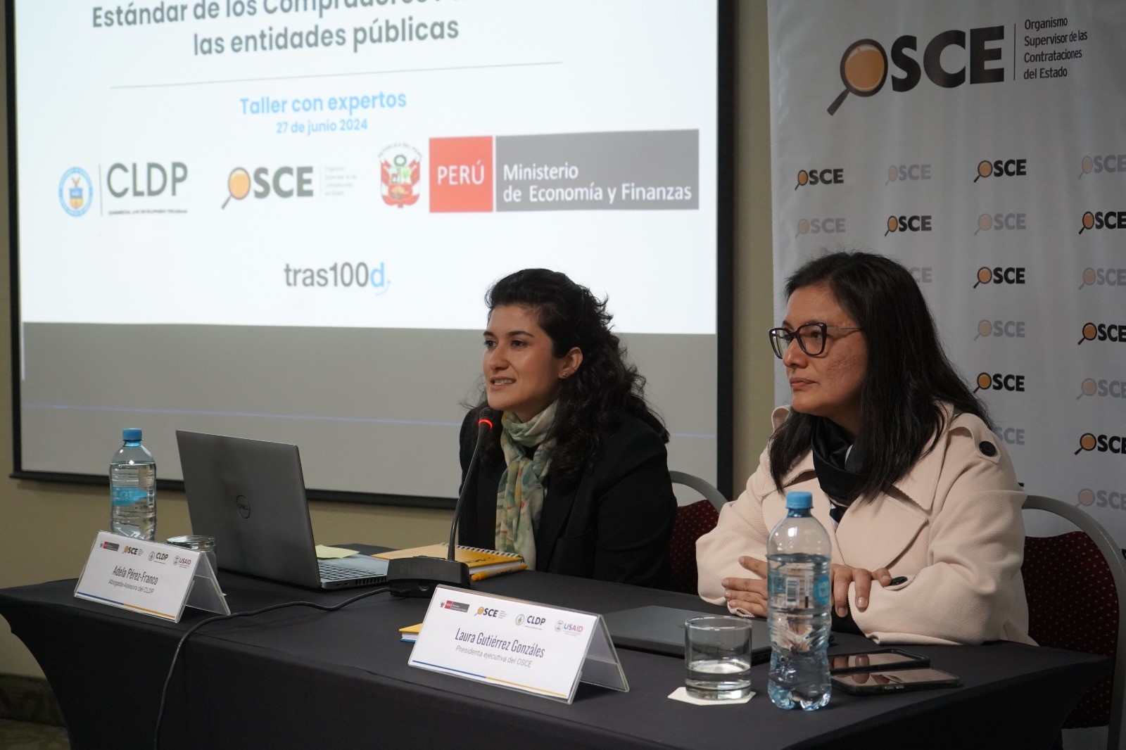 Two officials presenting