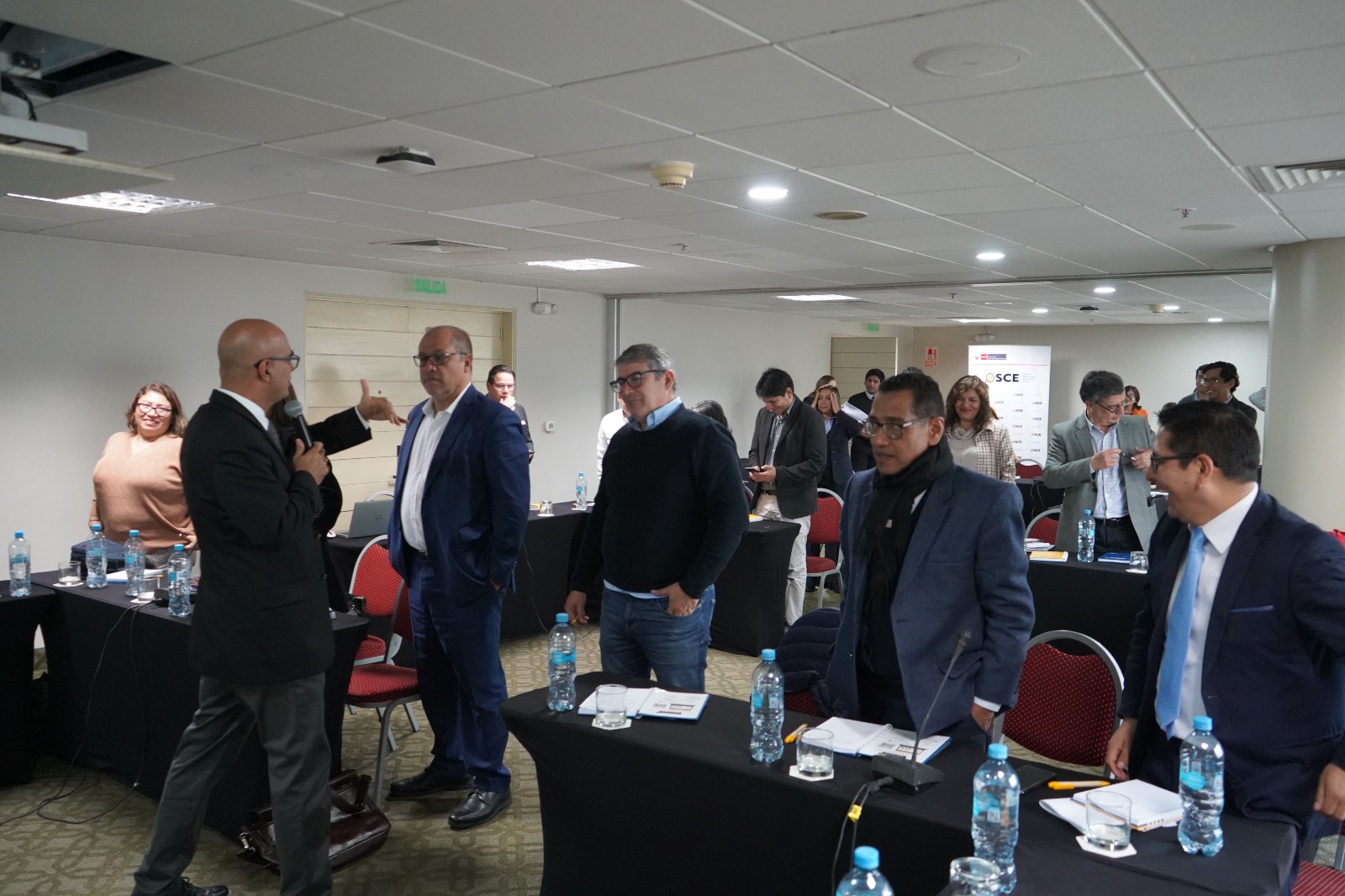 Procurement officials conversing