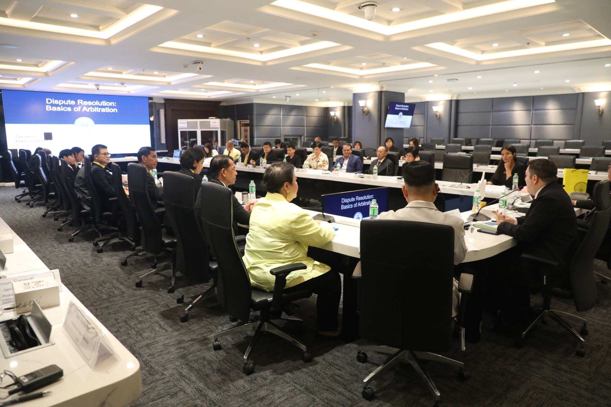 Participants listening to experts