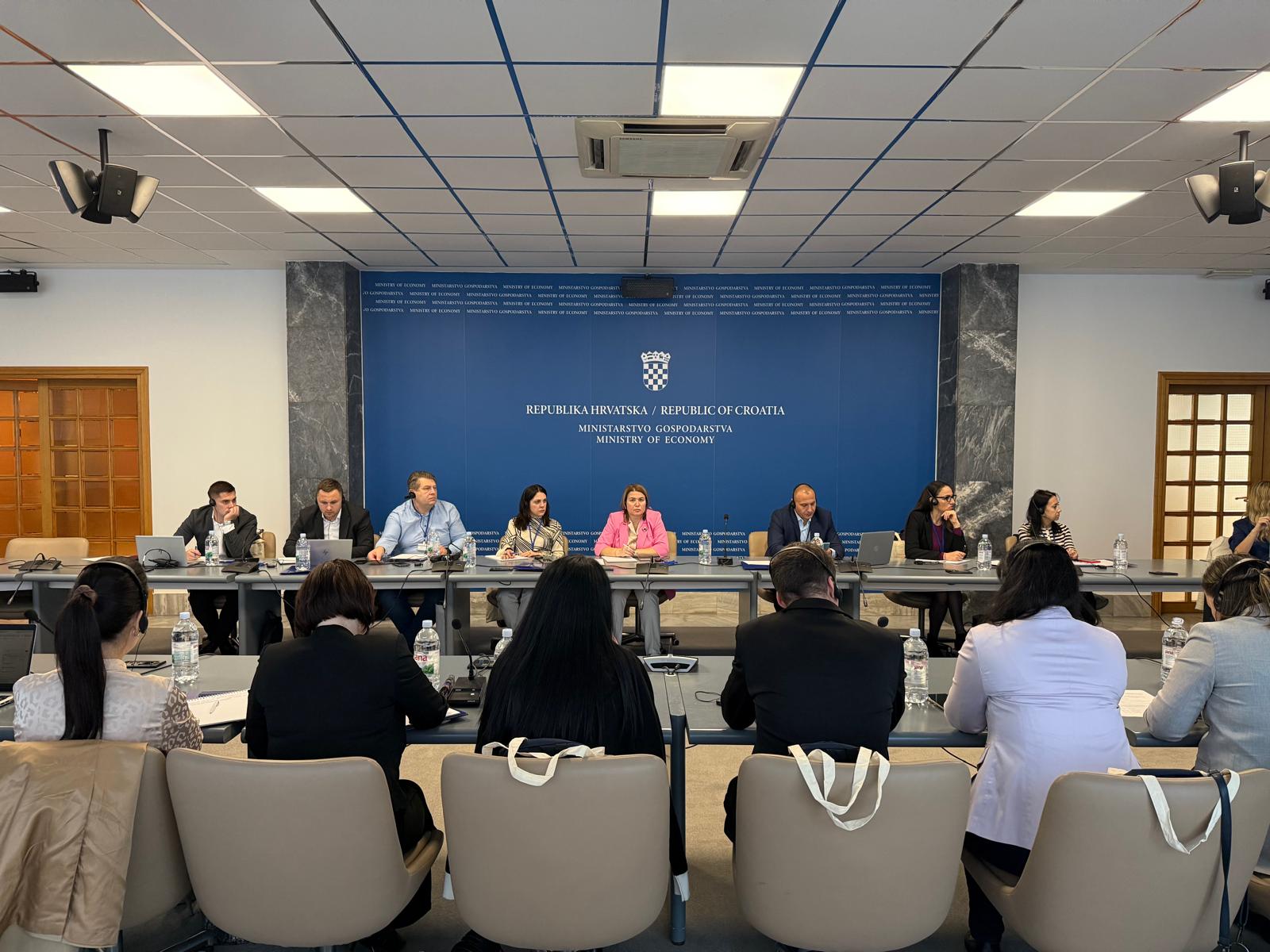 Moldova procurement workshop participants sitting at a round table
