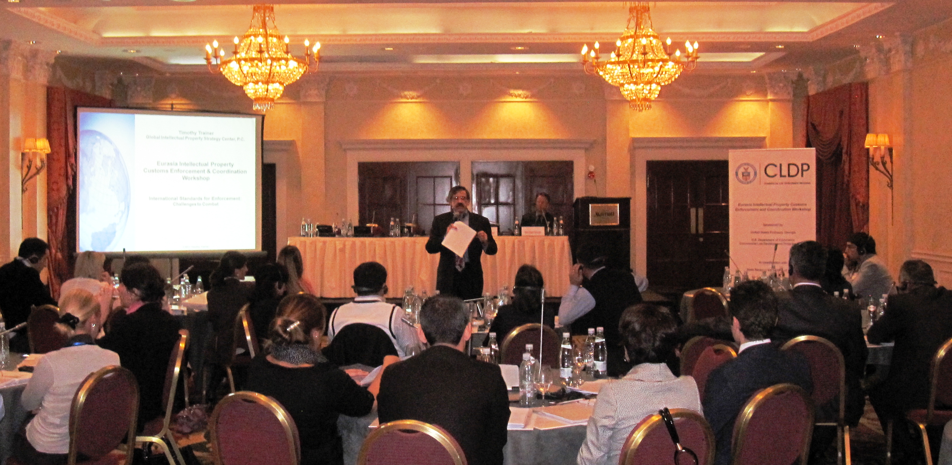 Intellectual Property Attorney Tim Trainer speaks to customs officials about the importance of IP enforcement and coordination.