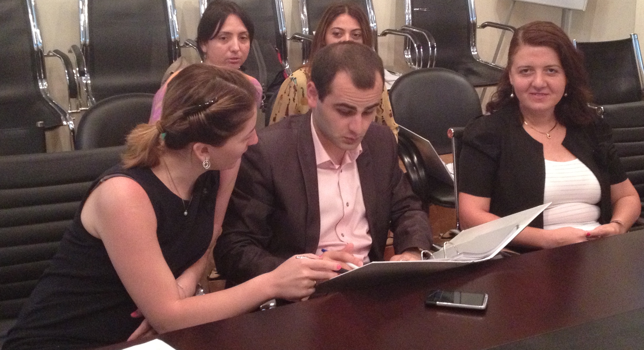 Participants work through a practical exercise on WTO trade remedies