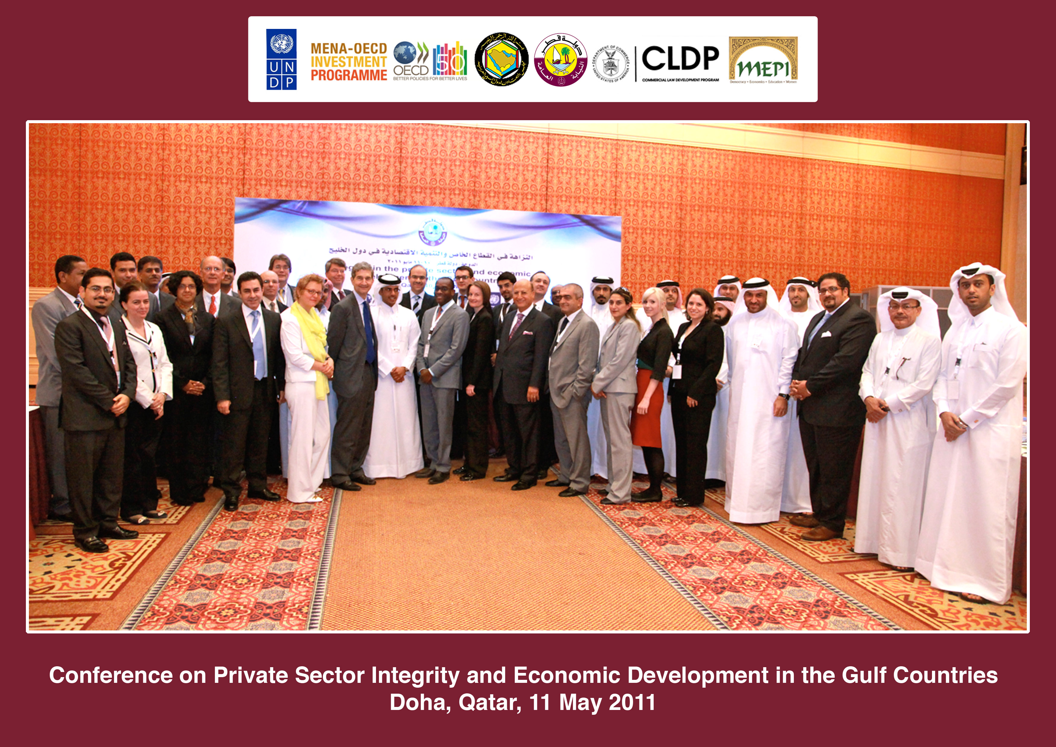 Public and private sector delegates to the conference pose for a group photo at the Ritz Cartlon in Doha, Qatar