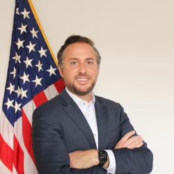 Headshot of Adam Al-Sarraf, Senior Counsel