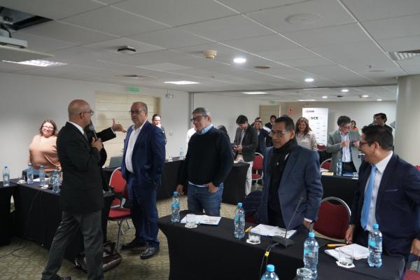 Procurement officials conversing