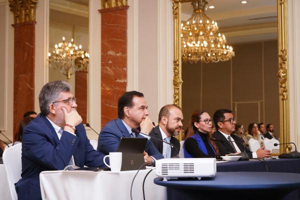 Participants listen to speaker at PPP technical session